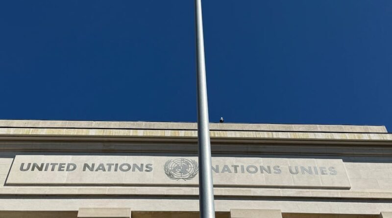 united nations headquarters in geneva with flag