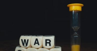 set of game dice forming message next to hourg