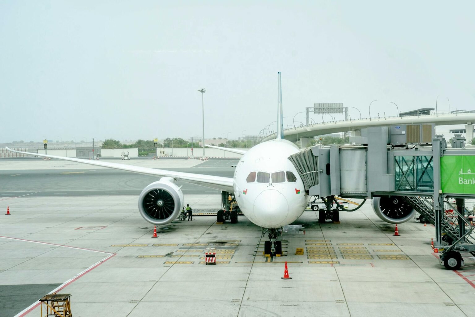 white airplane on the airport