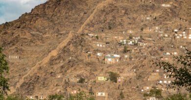 Magnitude 5.8 Earthquake Kills at Least 12 in Afghanistan, Including Eight Members of Refugee Family houses on brown mountain