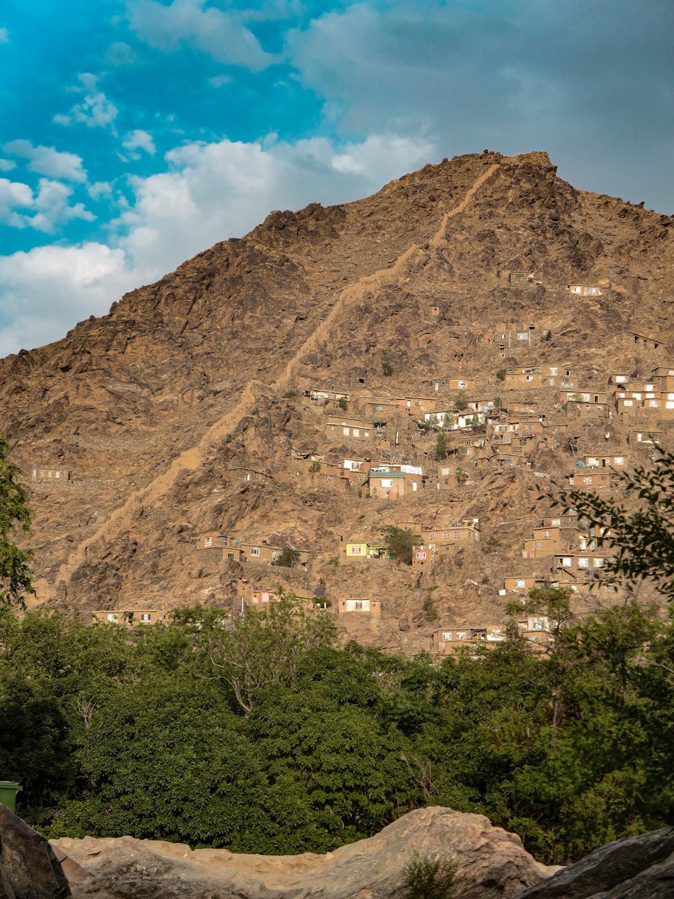 houses on brown mountain