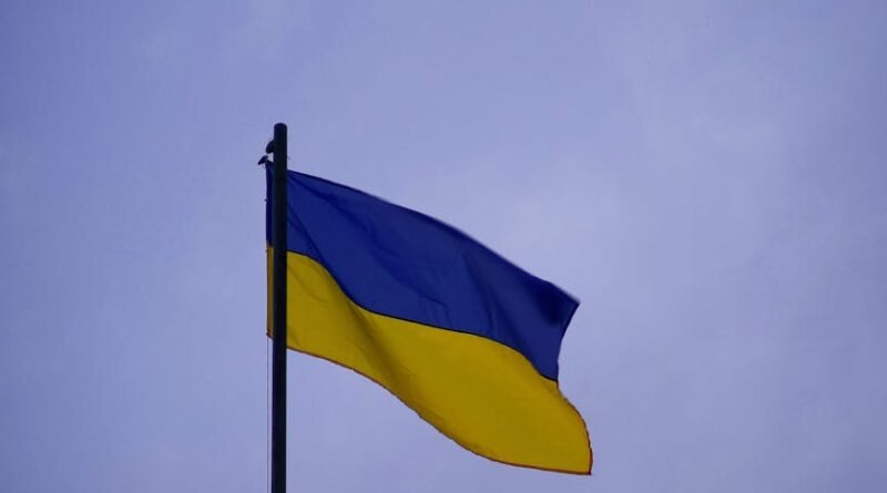 ukrainian flag waving against clear sky