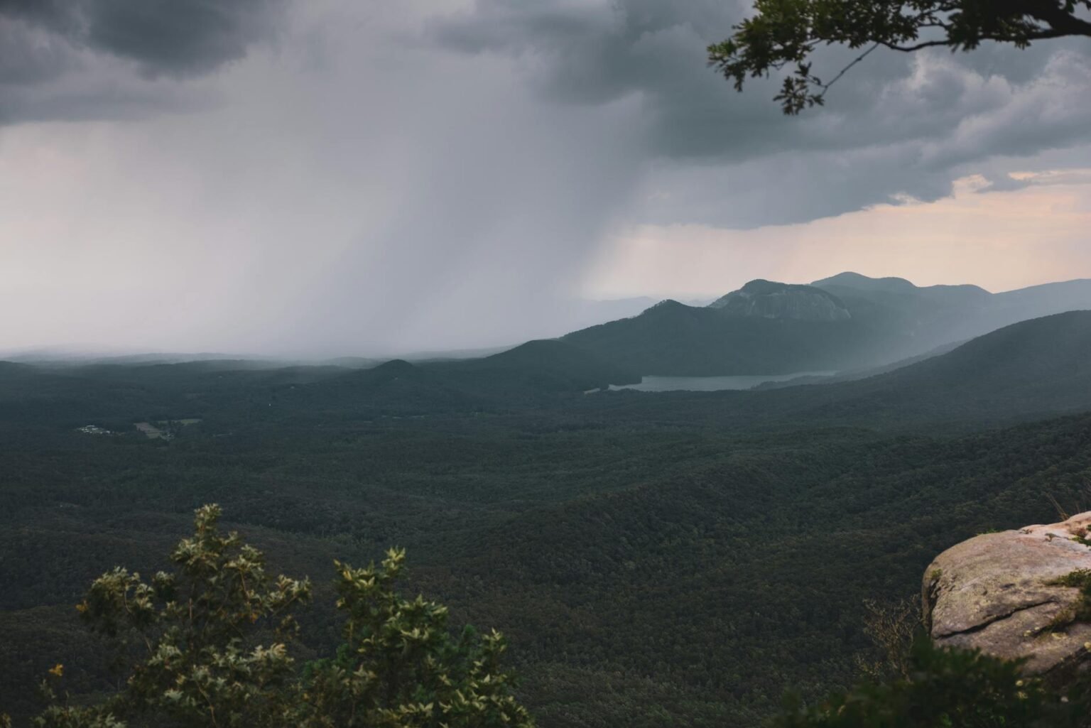 dramatic rainstorm over mountain landscape