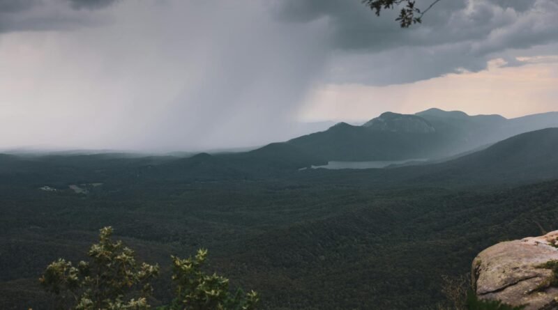 dramatic rainstorm over mountain landscape