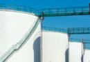 industrial storage tanks with walkway above