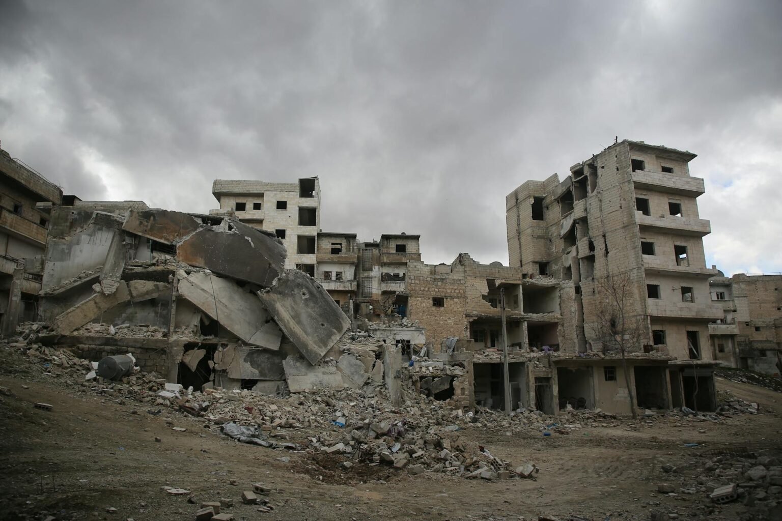 old abandoned building under cloudy sky