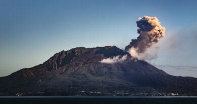 active volcano under blue sky