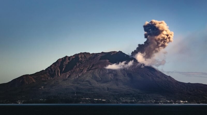 active volcano under blue sky