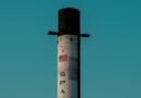 spacex post under clear blue sky
