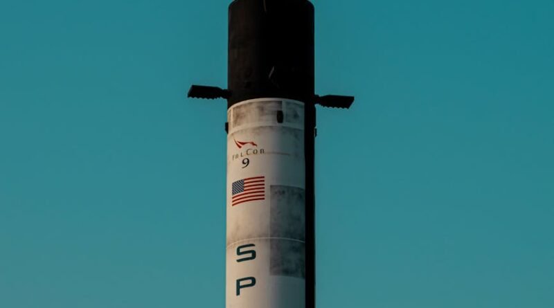 spacex post under clear blue sky