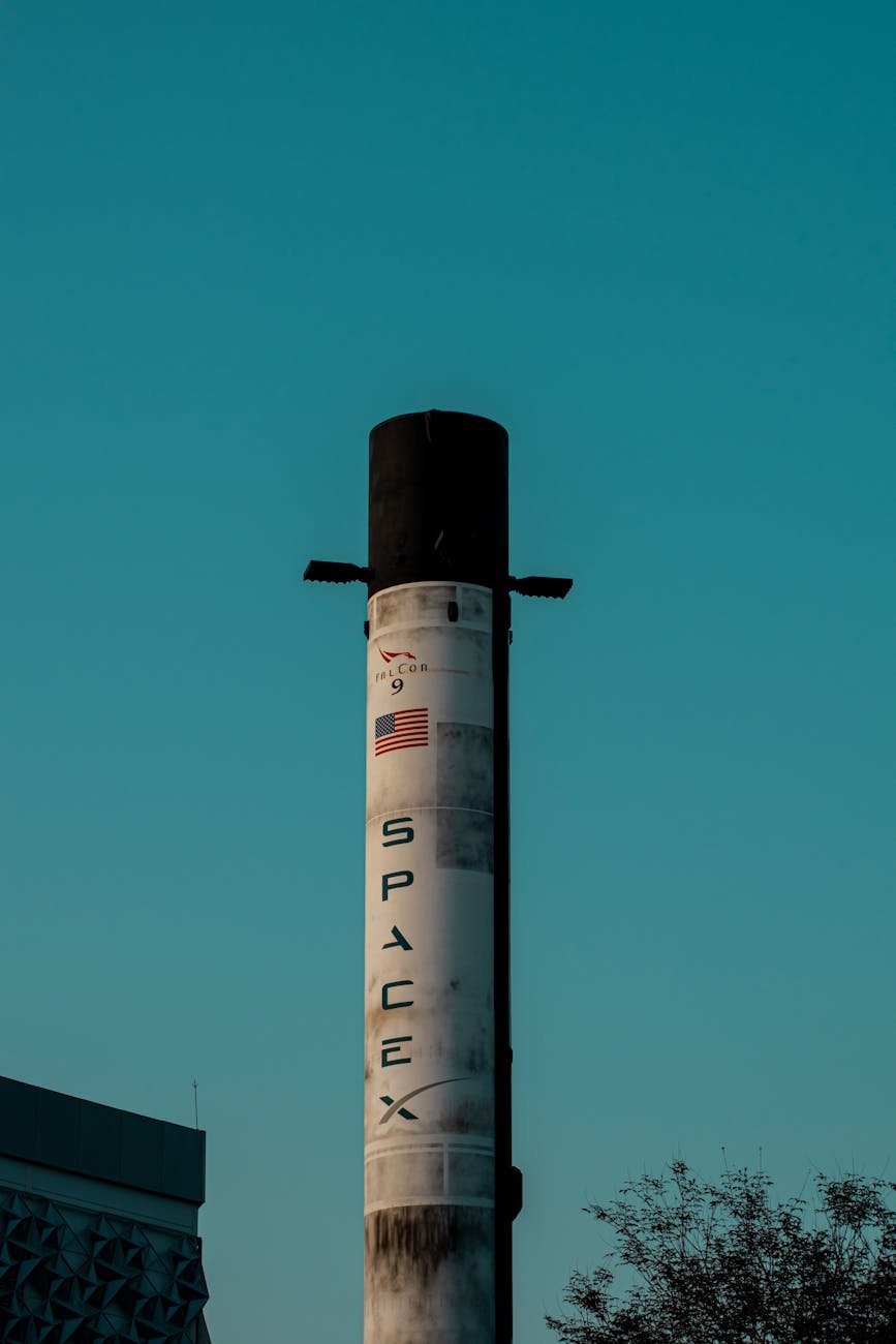 spacex post under clear blue sky