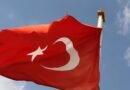 turkiye national flag waving against blue sky