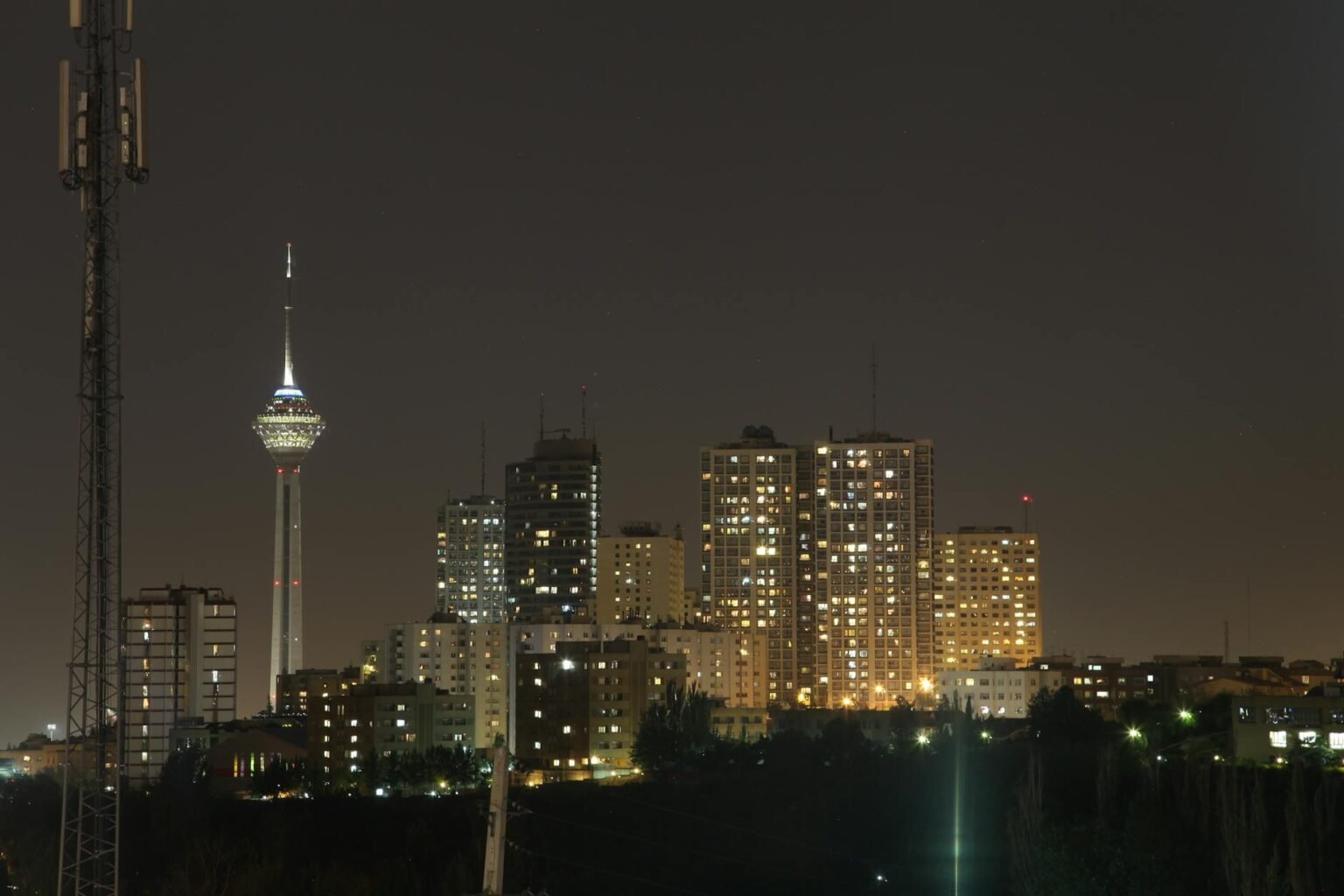 night skyline of tehran featuring milad tower