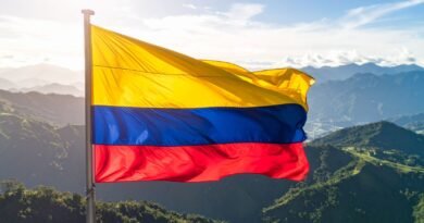 Over 50 Killed in Colombia Guerrilla Clashes as Presidential Election Nears colombian flag flies over andean landscape
