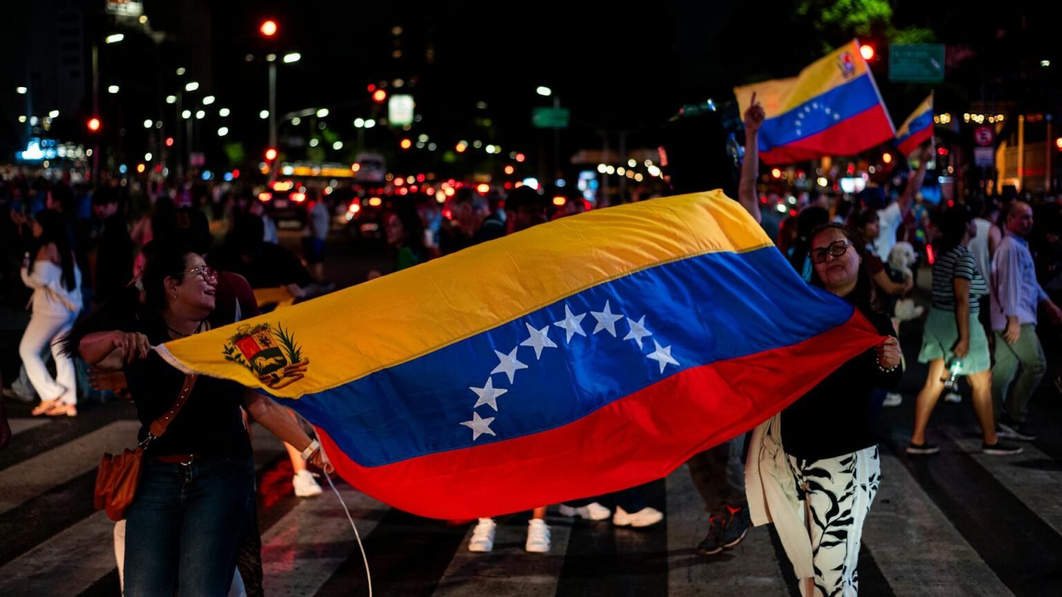 venezuelan flag waving at night in buenos aires