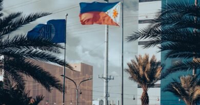 Building Collapse in Philippines Traps Dozens of Construction Workers philippine and sm flags in urban setting