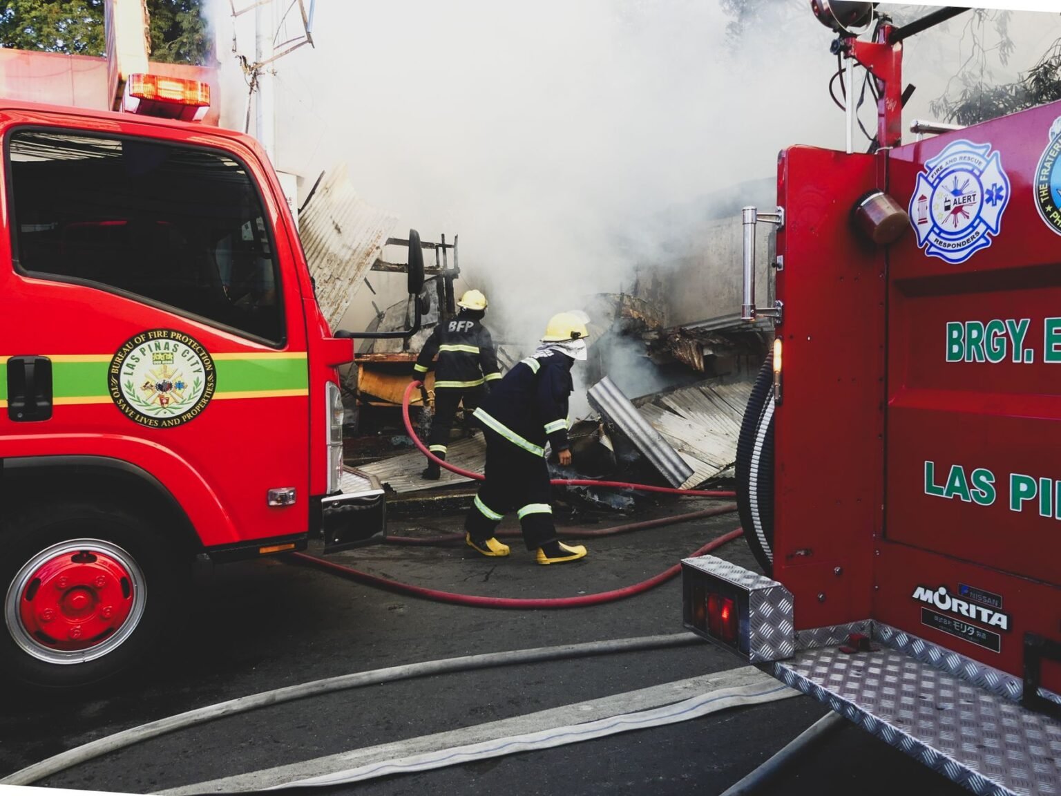 firetrucks and firefighters on street