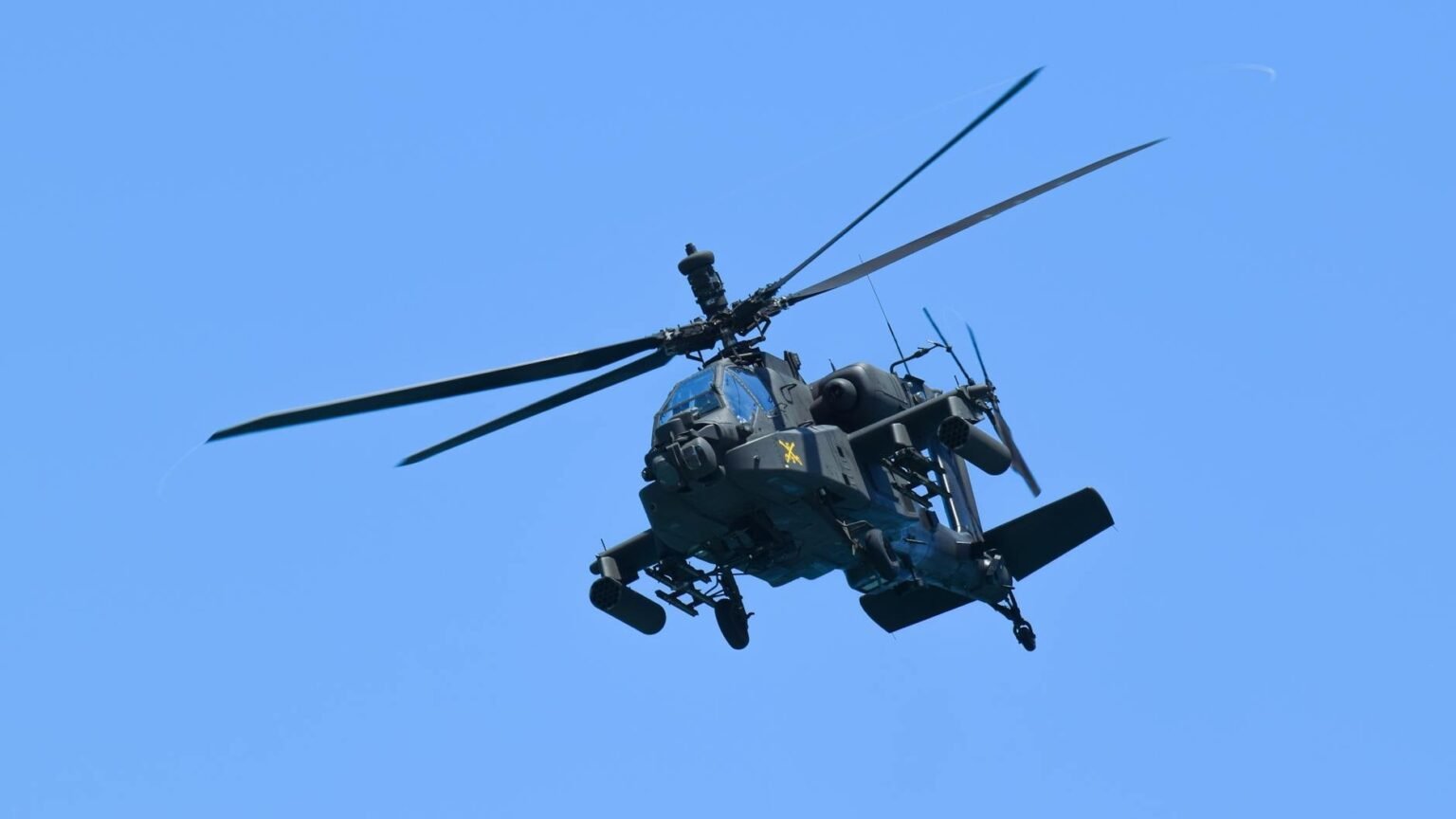 military helicopter in flight