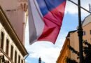Thousands Rally in Prague Against Government Plan to Overhaul Public Broadcasting Funding czech flag waving in prague city street scene