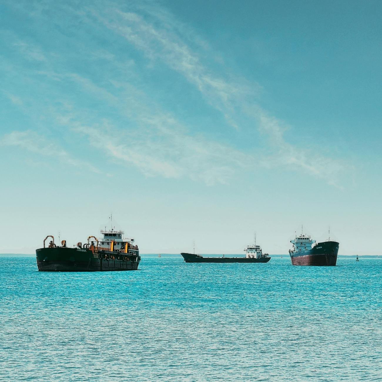 ocean scene with cargo ships