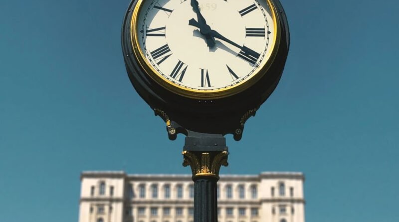 the clock in front of the parliament palace bucharest romania