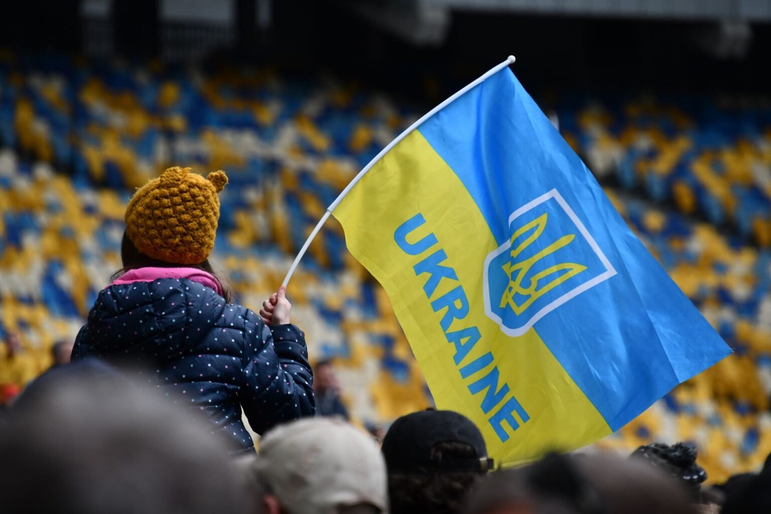 child with ukrainian flag