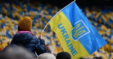 child with ukrainian flag