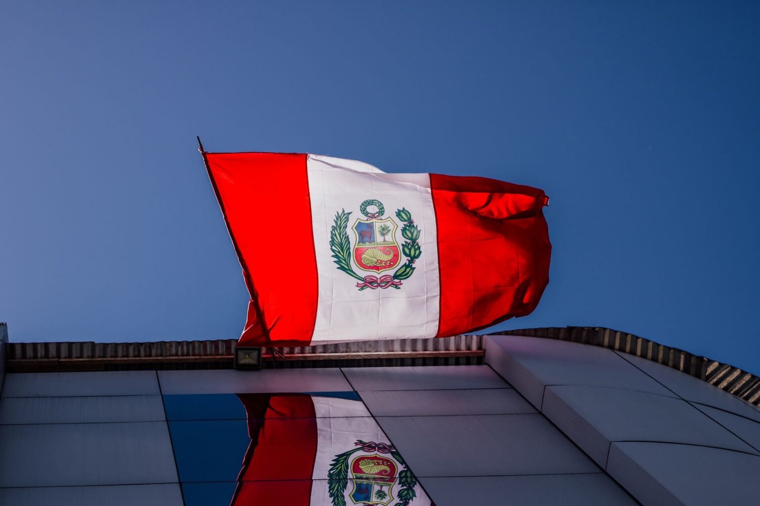 clear sky over peruvian flag