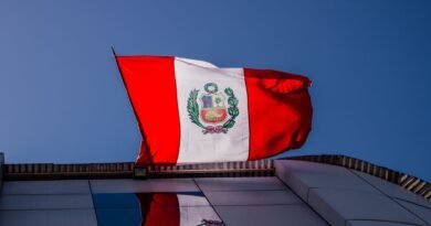 Keiko Fujimori is Peru’s new President Following Narrow Election Victory clear sky over peruvian flag