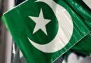 close up of pakistani flags with crescent and star