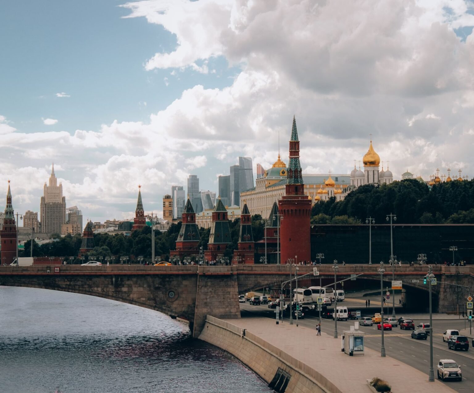 road along river and city skyline in moscow