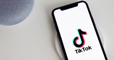TikTok Reaches $400 Million Settlement with US Justice Department Over Children’s Privacy Violations a cellphone with logo on the screen