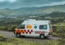a white ambulance on the road