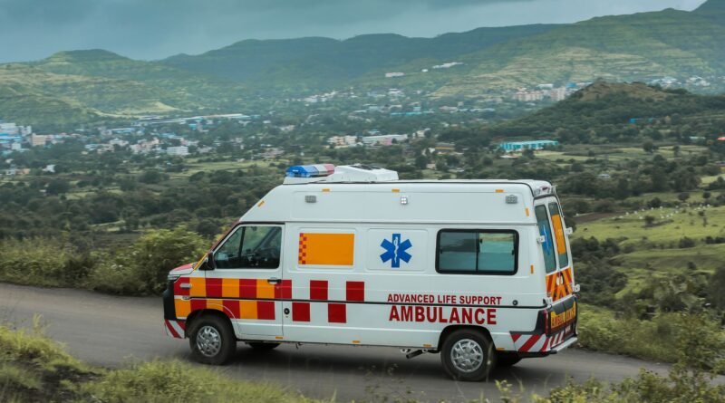 a white ambulance on the road