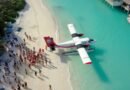 group of people near an airplane